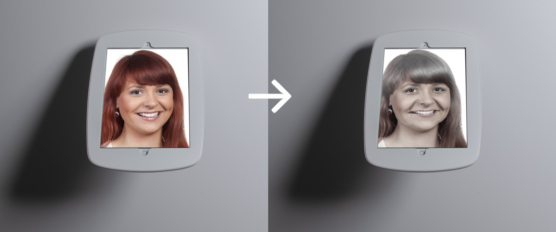 Vorher - Nachher Detailansicht der Verwandlung eines Gesichts einer jungen Frau auf dem Monitor mit Hilfe der Face-App